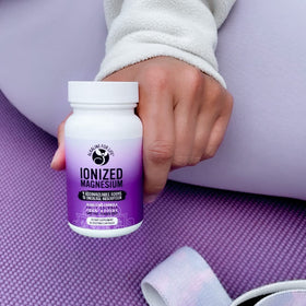 Capsules de Magnésium ionisé Alkaline for Life sur une surface