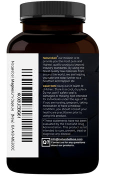 Capsules de magnésium NatureBell dans une cuillère en bois
