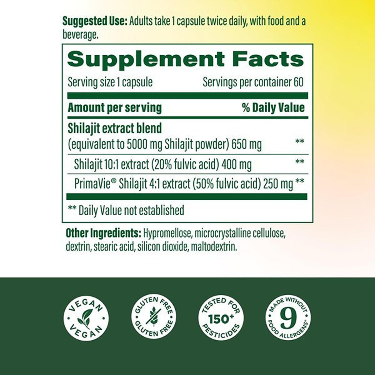 Capsules de MegaFood Shilajit sur une surface blanche