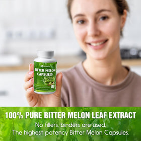 Capsules de melon amer FitVitality sur une table en bois