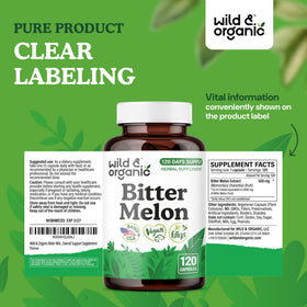 Capsules de melon amer Wild & Organic sur une table en bois