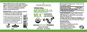 Capsules de Moringa Sweetbottoms dans une main