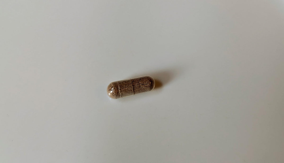 Capsules de Mullein Vitalité Now! dans un verre