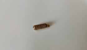 Capsules de Mullein Vitalité Now! dans un verre