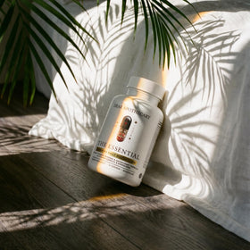 Capsules de multivitamine Dear Apothecary sur une table en bois
