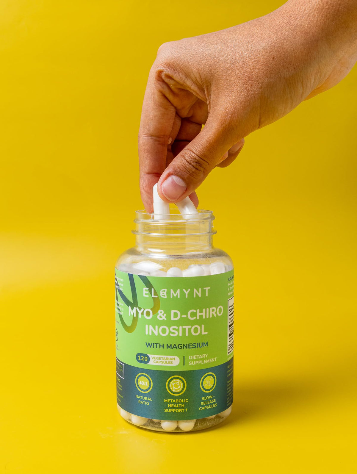 Capsules de Myo-Inositol & D-Chiro Inositol ELEMYNT sur une surface blanche