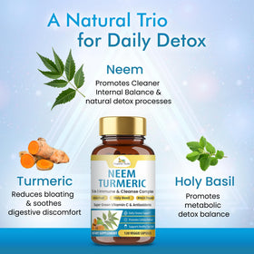 Capsules de Neem et Curcuma Organic Veda dans une main