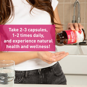 Capsules de Nopal Rouge Maxx Herb à côté d'un verre d'eau