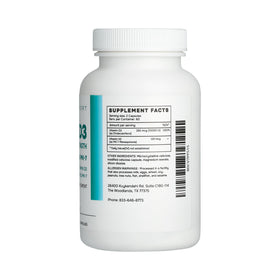 Capsules de Nurse Julli K2 + D3 sur une surface blanche