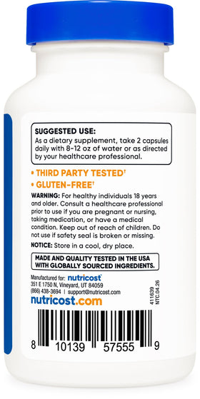 Capsules de Nutricost NAD+ sur une surface en bois