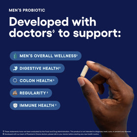Capsules de Physician's CHOICE Probiotiques pour Hommes sur une surface blanche