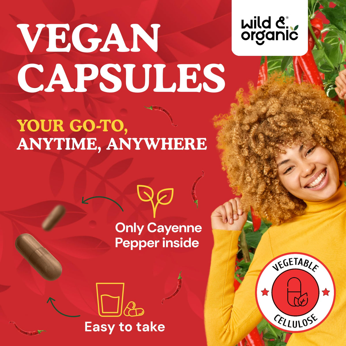 Capsules de piment de cayenne Wild & Organic dans une main