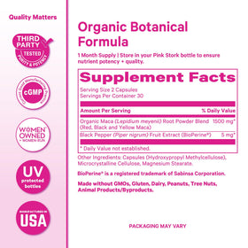 Capsules de racine de maca bio Pink Stork sur une table en bois