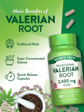 Capsules de racine de valériane Nature's Truth à côté d'un verre d'eau