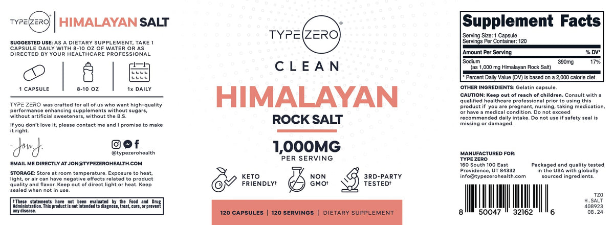 Capsules de sel de mer himalayen Type Zero à côté d'un verre d'eau