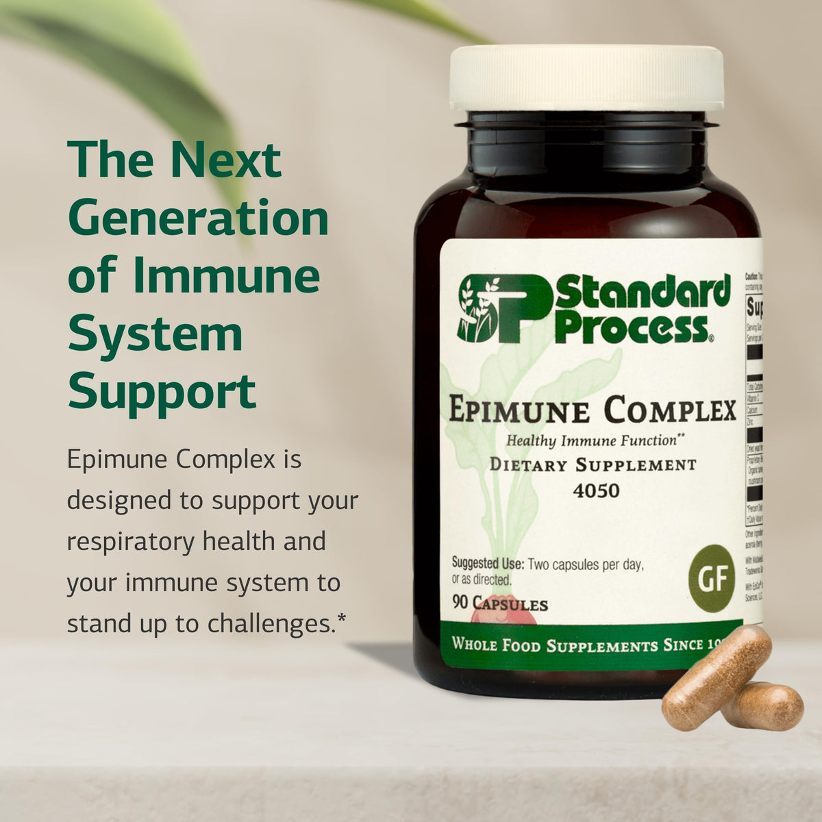 Capsules de Standard Process Epimune Complex dans une cuillère