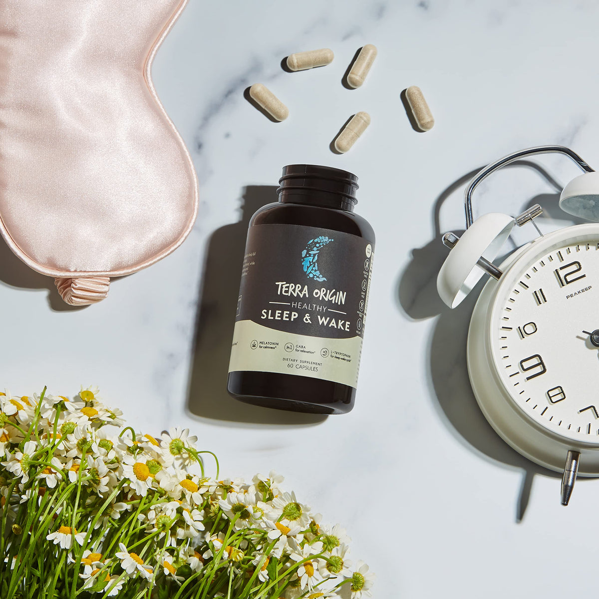 Capsules de TERRA ORIGIN Sommeil Naturel dans une main