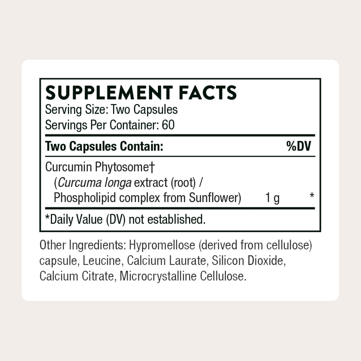 Capsules de THORNE Curcumin Phytosome sur une surface blanche