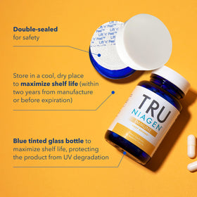 Capsules de TRU NIAGEN sur une surface blanche