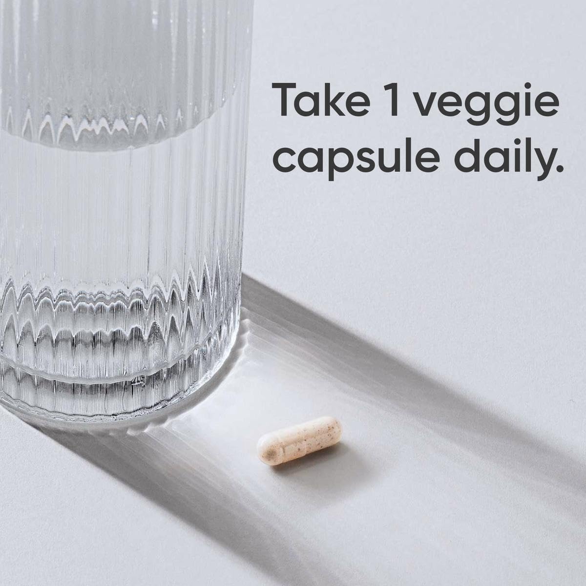 Capsules de Vinaigre de Pomme 500mg + Piment de Cayenne de Sports Research sur fond blanc