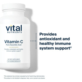 Capsules de Vitamine C Vital Nutrients sur une surface blanche