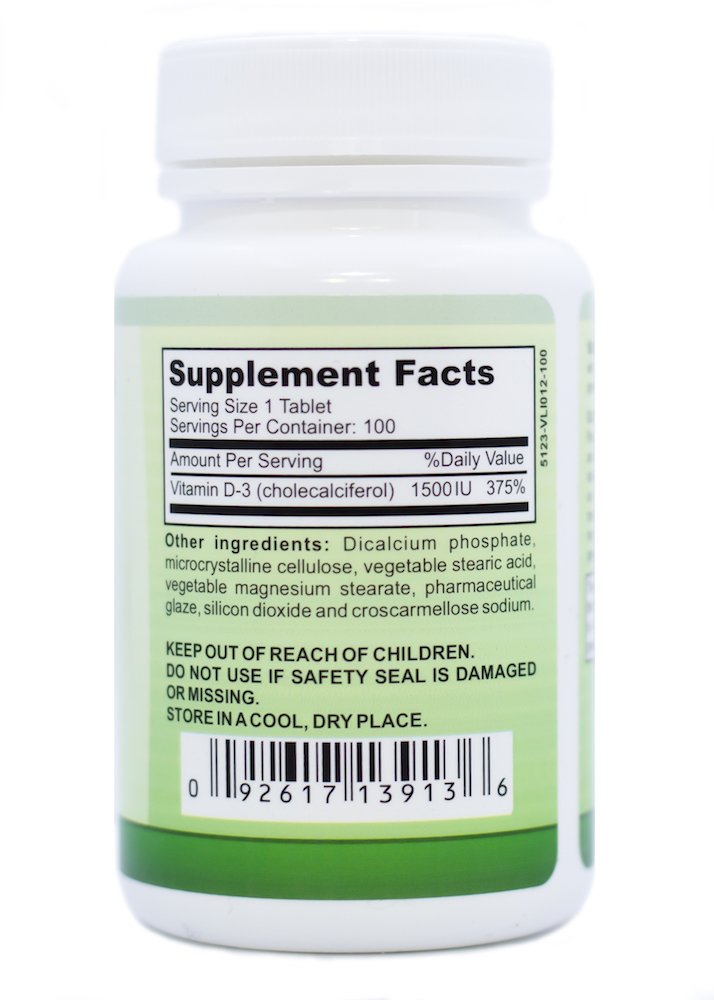 Capsules de Vitamine D3 Great Lakes Nutrition dans un verre