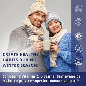 Capsules du Complexe de Vitamine C AgeImmune sur une surface blanche
