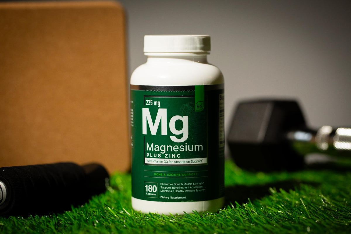 Capsules Essential Elements sur une surface en bois
