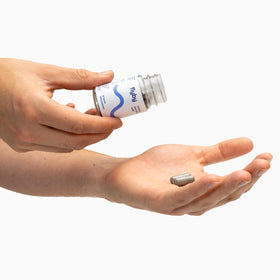 Capsules Flyby use sur une table en bois