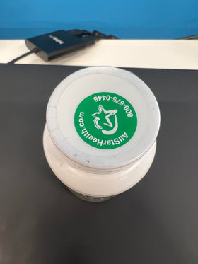 Capsules H.E.A.L. Quick avec un verre d'eau
