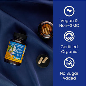Capsules Herb Pharm à côté d'un verre d'eau