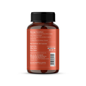 Capsules Jiva Ayurveda Kutki sur une surface en bois