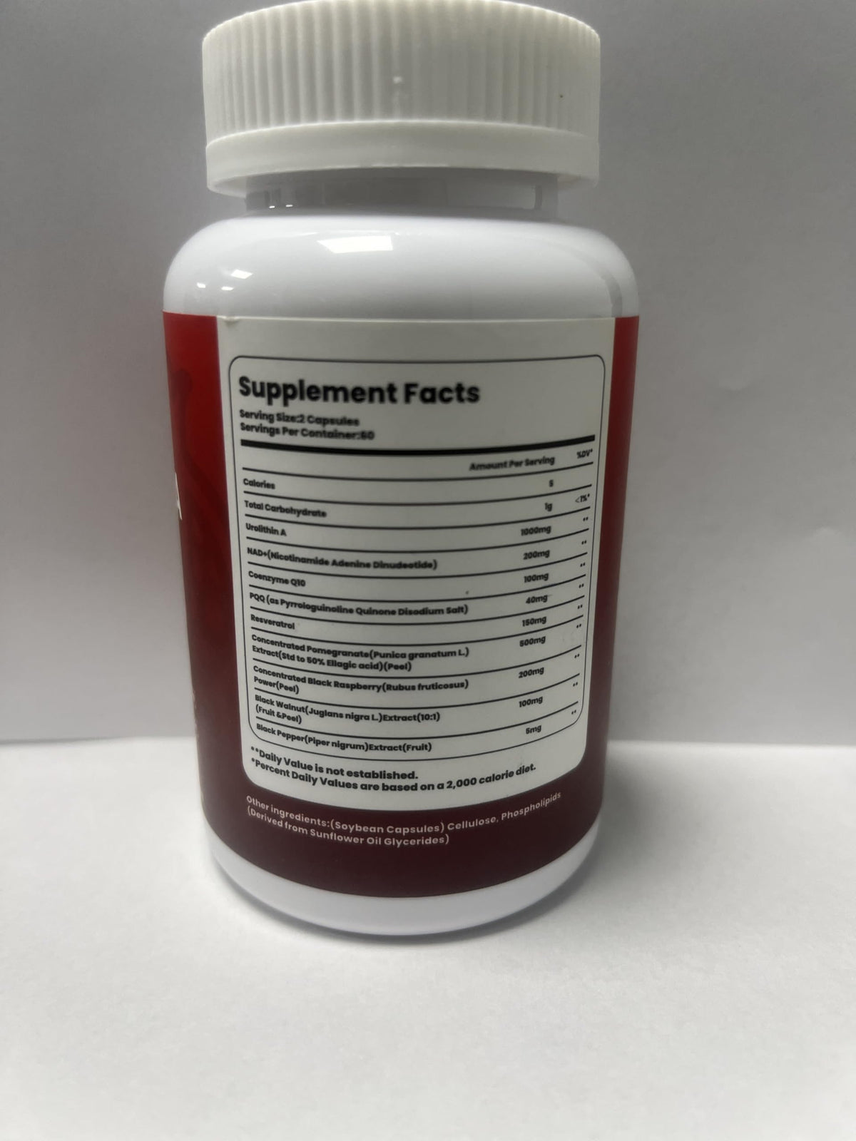 Capsules Lipovis Urolithin A sur une table en bois