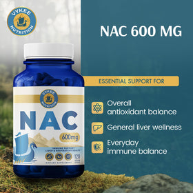 Capsules NAC Vykee Nutrition sur une surface blanche