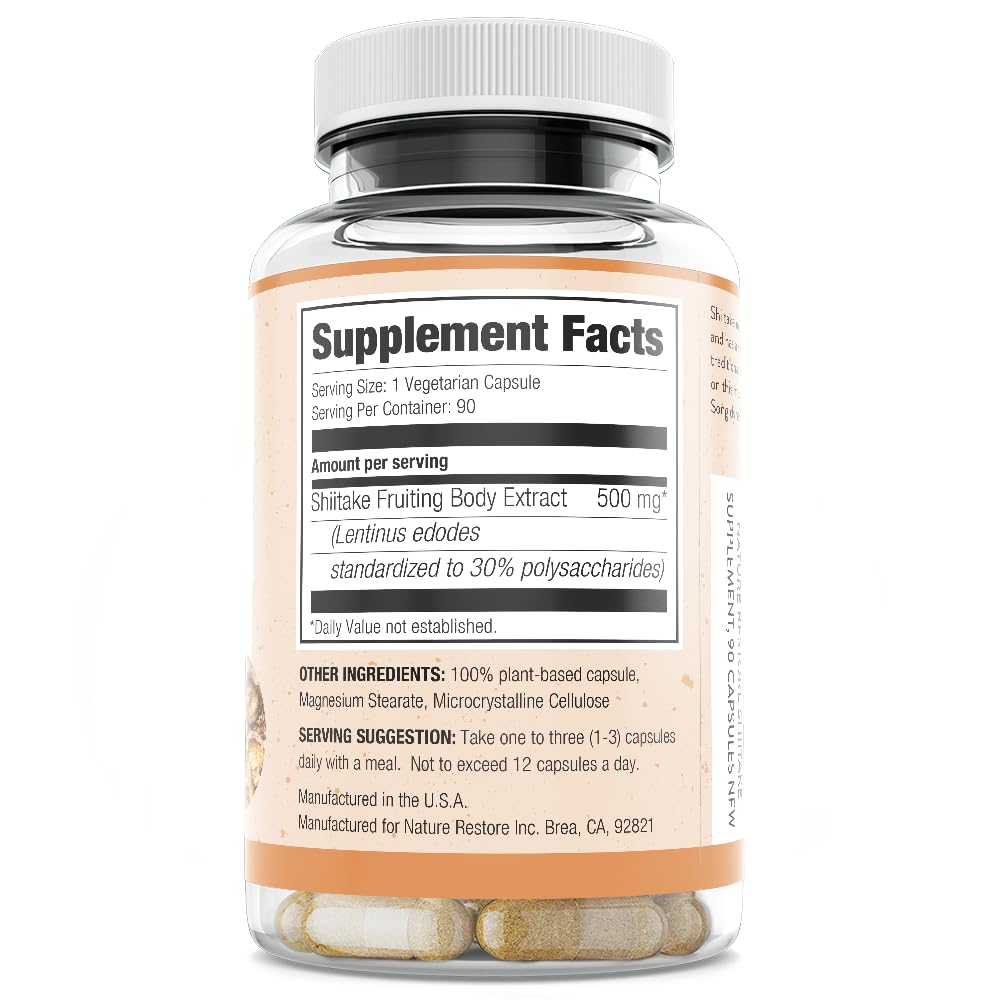 Capsules Nature Restore Shiitake sur une surface blanche