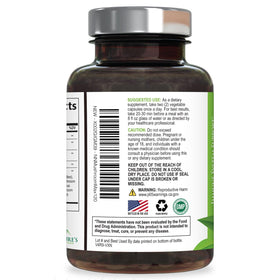 Capsules Nature's Nutrition sur une table en bois