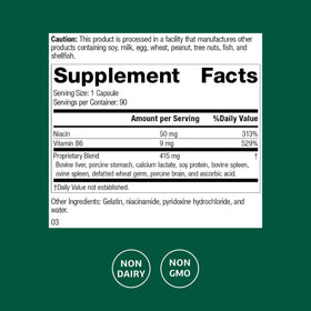 Capsules Niacinamide B6 de Standard Process sur une surface blanche