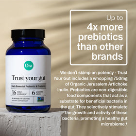 Capsules Ora Organic avec ingrédients naturels en arrière-plan