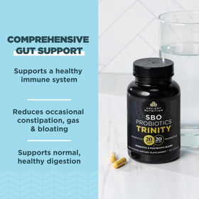 Capsules SBO Probiotic Trinity d'Ancient Nutrition sur une surface blanche