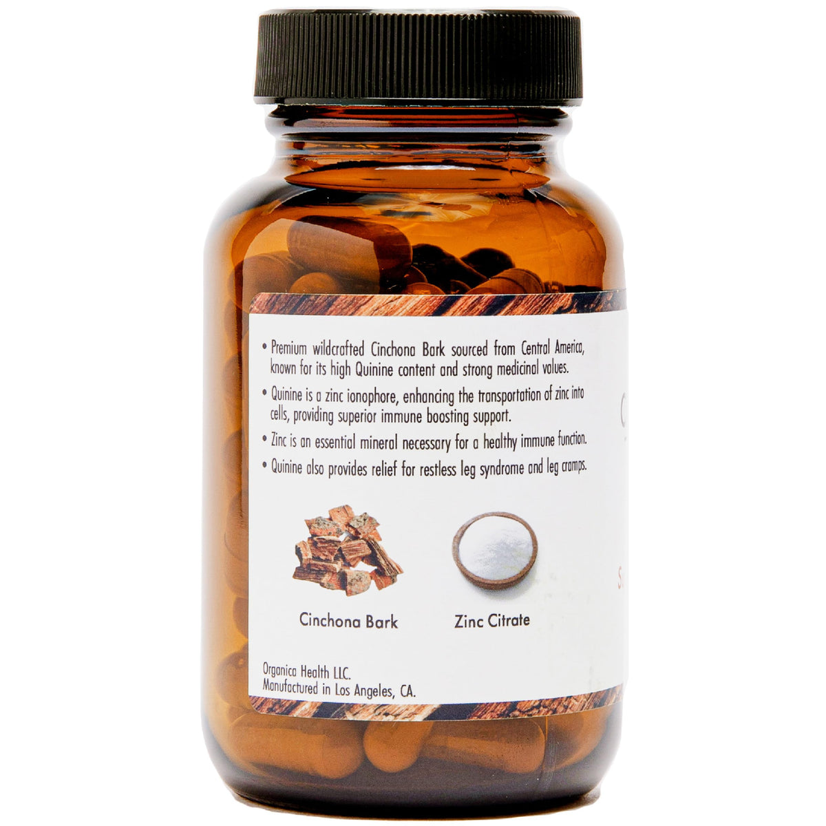 Capsules végétales d'OrganicaHealth Quinine sur une surface blanche