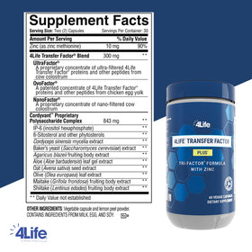 Capsules végétales de 4Life Transfer Factor Plus Zinc sur une surface blanche
