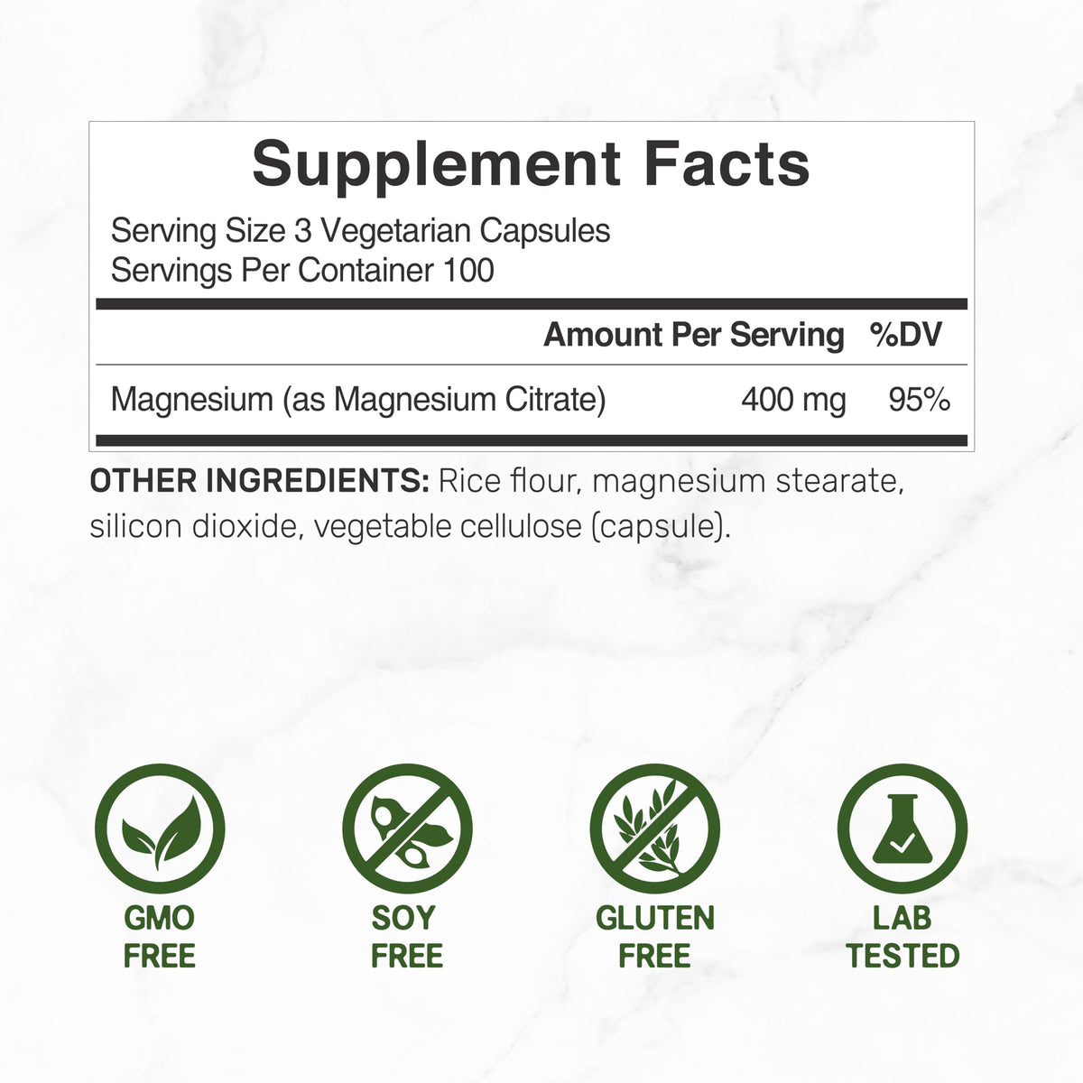 Capsules végétales de citrate de magnésium sur une surface blanche