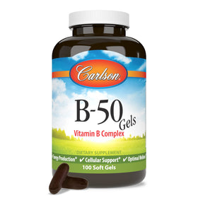 Carlson B-50 Gels gélules à côté d'un verre d'eau