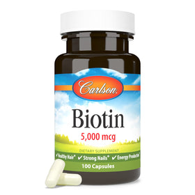 Carlson Biotin 5000 mcg capsules sur une table