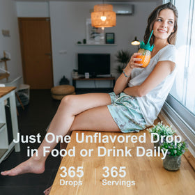 Carlson Super Daily D3 gouttes dans un verre d'eau