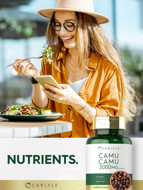 Carlyle Camu Camu capsules on wooden table