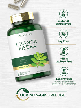 Carlyle Chanca Piedra capsules sur une table en bois