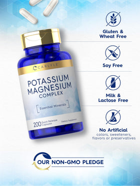 Carlyle Complément Alimentaire Potassium et Magnésium 200 Capsules sur une table en bois