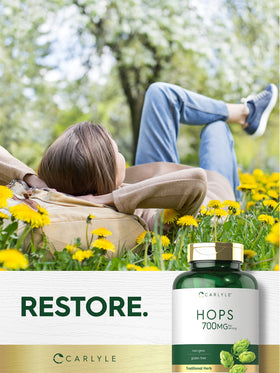 Carlyle Hops 700mg capsules in a hand