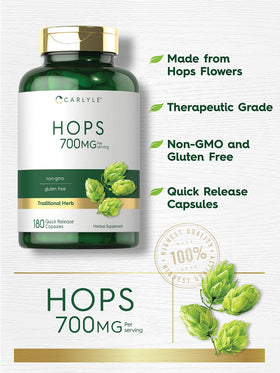 Carlyle Hops 700mg capsules on wooden surface